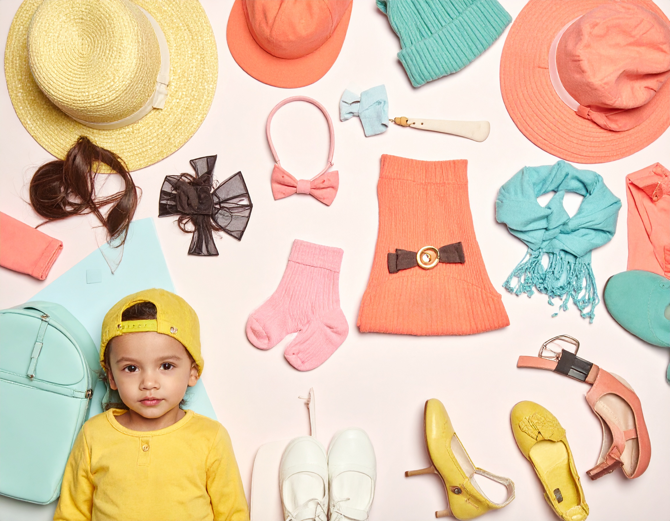 A collection of kids accessories including hats and bags from Cub Extras